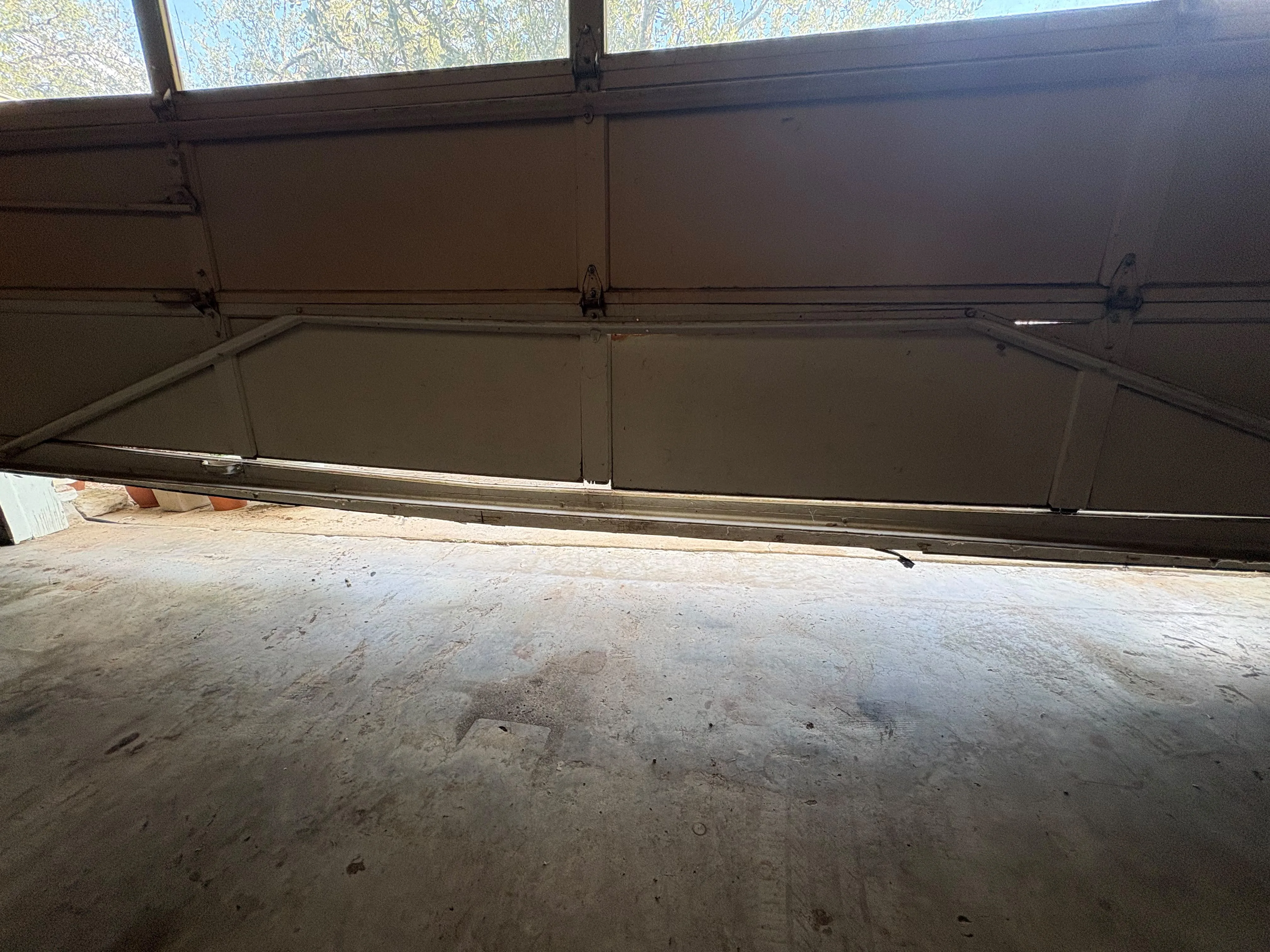 Before - 40-year-old rotten wood garage door Austin TX