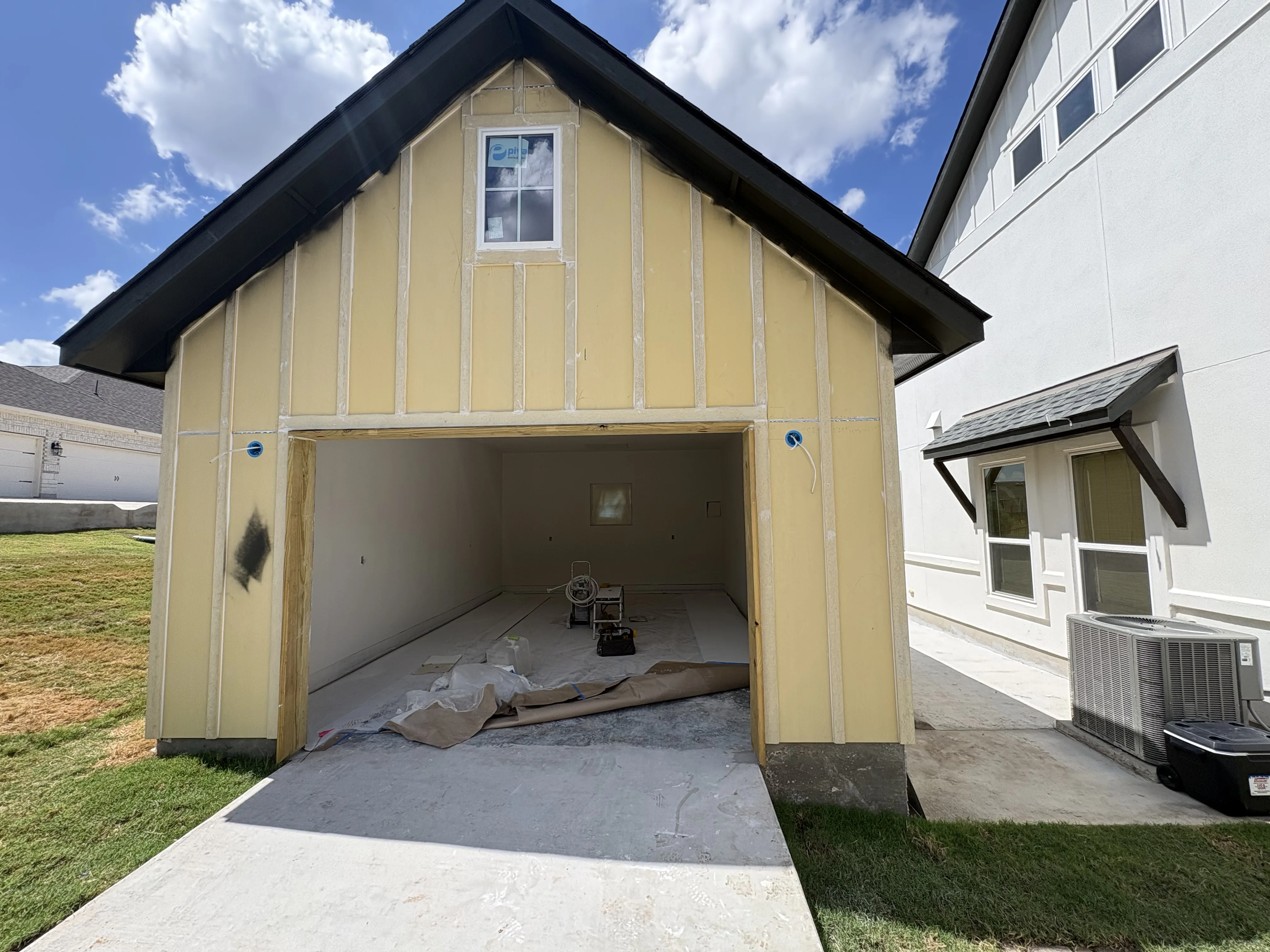 Before - garage opening without door Cedar Creek TX